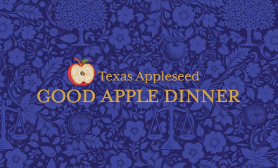 A sliced apple with words "Texas Appleseed" and "Good Apple Dinner" against a blue wallpaper-style backdrop featuring florals, apples, and scales of justice