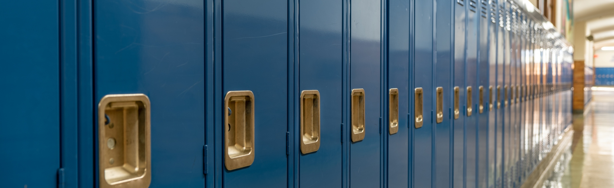 Row of blue lockers in a school