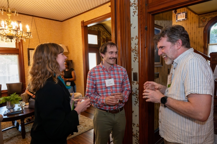 People talking at Austin Birthday Party
