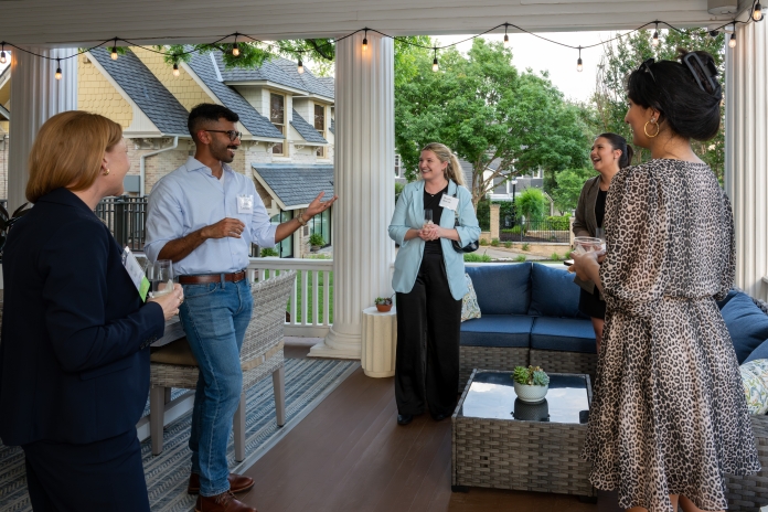 People talking at Austin Birthday Party