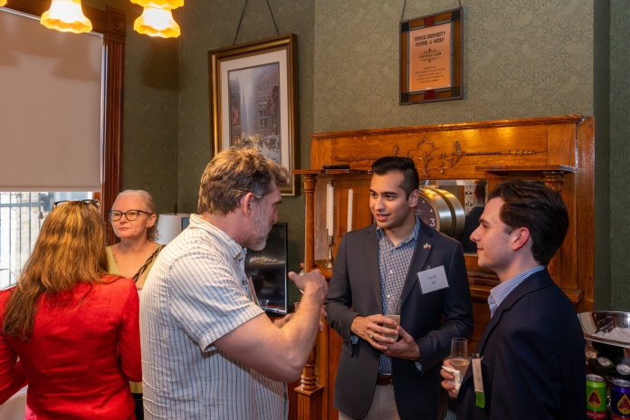 People talking at Austin Birthday Party