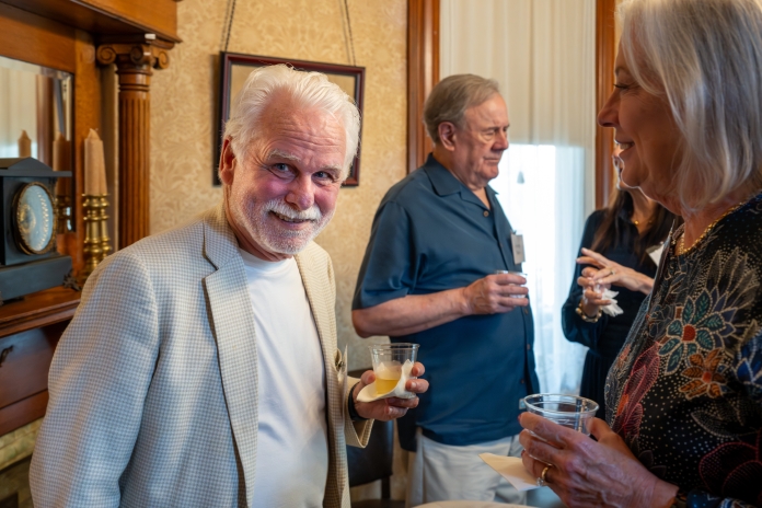 People smiling at Austin Birthday Party