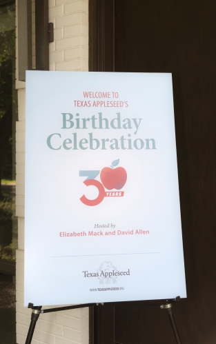 Welcome sign for Texas Appleseed's 30th birthday party in Dallas