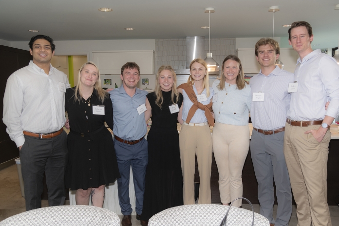 People attending Texas Appleseed's 30th birthday party in Dallas