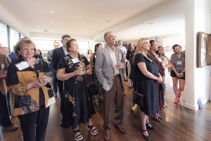 People attending Texas Appleseed's 30th birthday party in Dallas